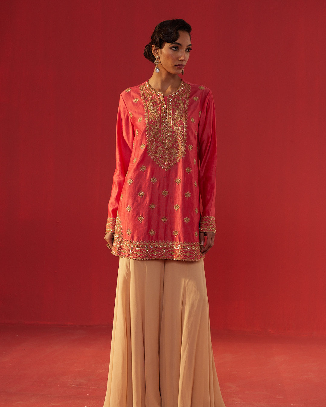 Full Hand Work Embellished Yoke Peach Short Kurta & Flared Sharara Set