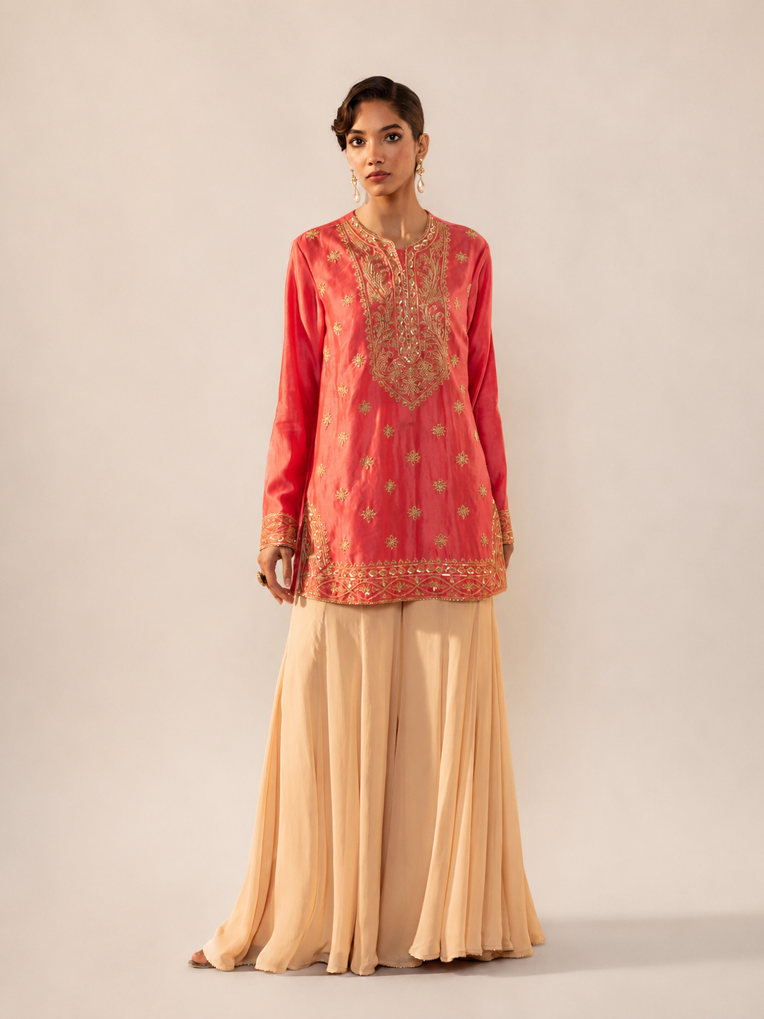 Full Hand Work Embellished Yoke Peach Short Kurta & Flared Sharara Set